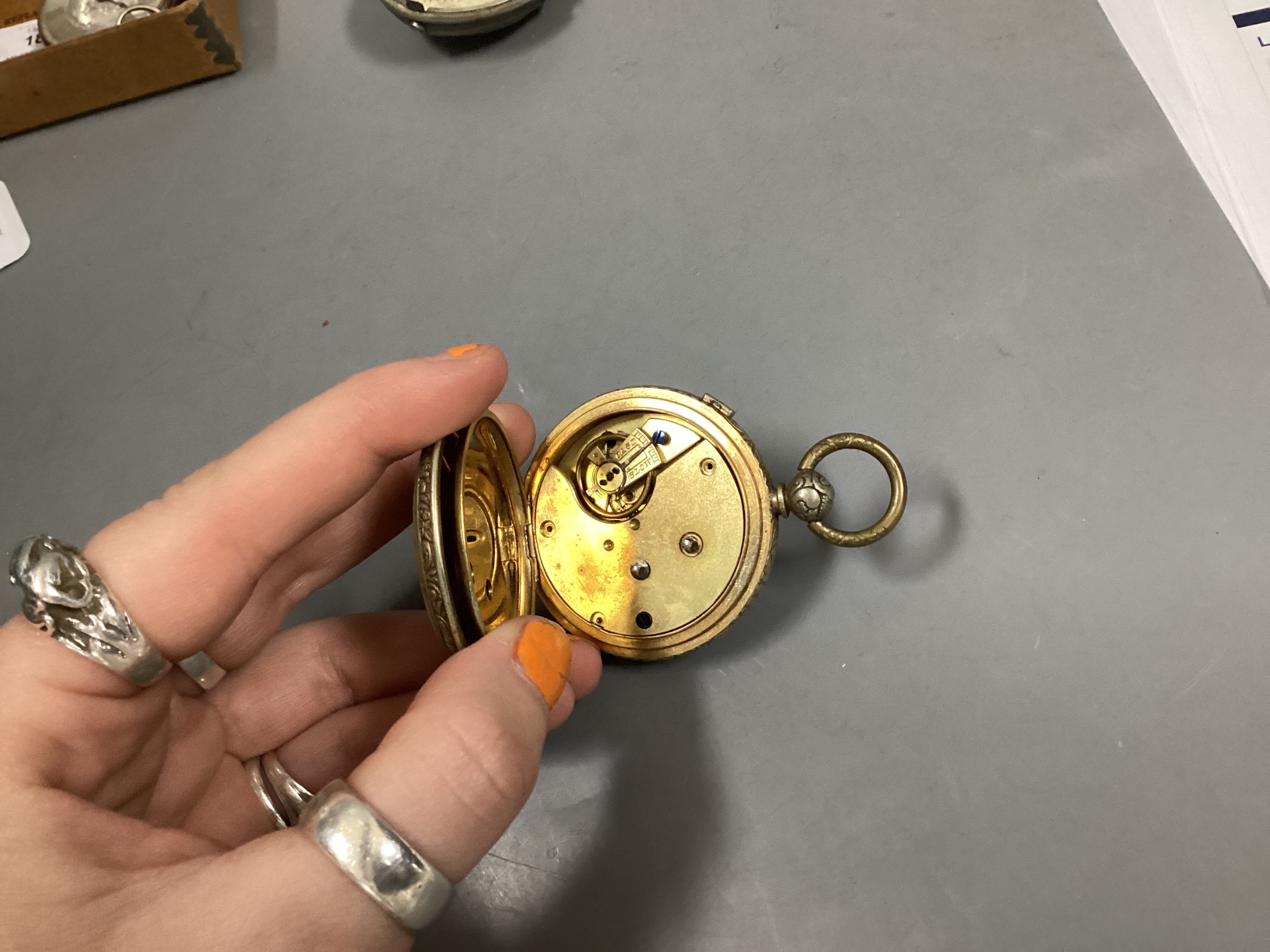 An 18th century silver pair cased keywind verge pocket watch, by T. Moore, London (repair) and two other pocket including silver.